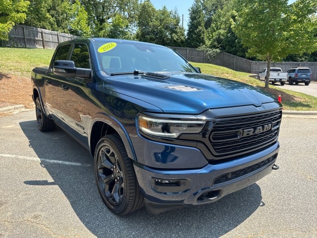 2023 RAM 1500 Limited Crew Cab 4x4 5'7" Box in Blue — front three-quarter view