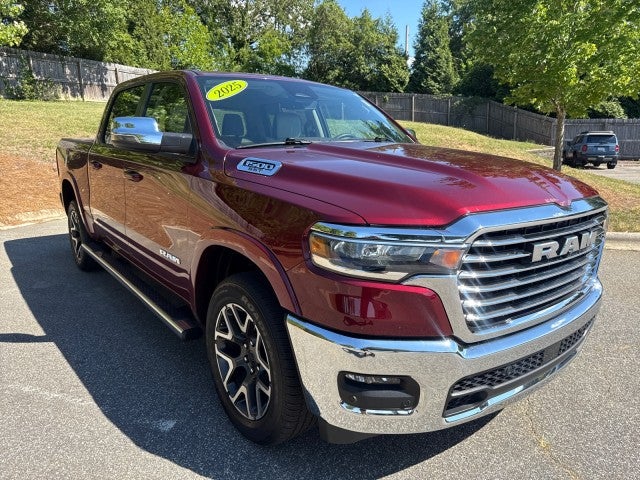 2025 RAM 1500 Laramie in Delmonico Red Pea — front three-quarter view