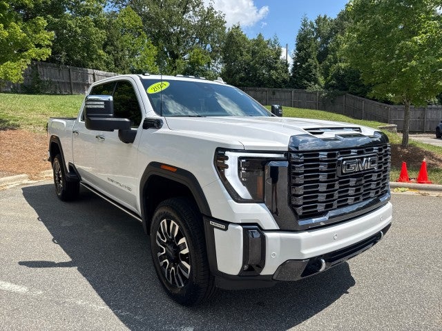 2024 GMC Sierra 2500 HD Denali Ultimate in White Frost Tricoat — front three-quarter view