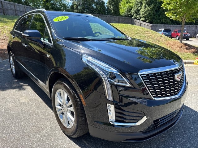 2024 Cadillac XT5 Luxury in Stellar Black Metallic — front three-quarter view